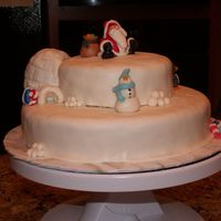 Christmas Cake With Santa, Snowman, Penguins, And An Igloo. 