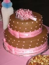 Baby Girl Shower Cake Pink & Brown Baby Shower Cake. The shower was a Princess theme. The cake was buttercream icing with ribbon.