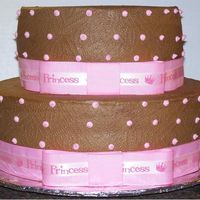 Pink & Brown Princess Cake This is a 12" Chocolate with Chocolate Filling and an 8" White w/Lemon Filling on top. This was my first cake using ribbon. It is...