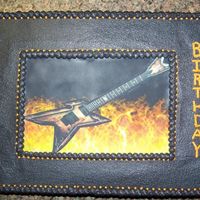 Electric Guitar Edible Image Cake This was for a guys birthday. They took a picture of his guitar and I printed it on an edible image sheet. I also printed flames for the...