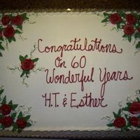 Full Sheet 60Th Anniversary Cake This is a full sheet half choco half white cake. All buttercream icing.