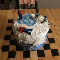 Winter Cake Another first - Royal Icing! Pond and figures are fondant, snow and snowflakes are royal. My figures didn't come out exactly the way I...