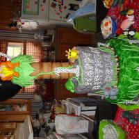 Jungle 2 teir cake covered in fondant. Fondant Monkey and Fondant animals. This was for my babys first birthday this last saturday. He loved it,...