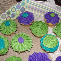 Spring Bridal Shower Mini cupcakes for a spring bridal shower. The paper you see in the back was used by the client to make wrappers for the cuppies, thus the...
