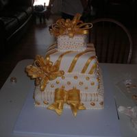 Debutante 18Th Cake Fondant icing, gumpaste bows and royal icing painted gold beads. This is what I thought was a pom pom bow.