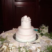 Fondant With Dots In Royal Icing Thank you all for your help. Butter Cake recipe with almond filling. Bought a cake level and fondant smoother this time so it looks a...