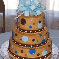 Baby Shower Cake This cake is iced in buttercream and then I used fondant accents. This cake was made to match the invitations for the baby shower.