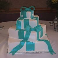 Square Fondant With Bows Wedding Cake So glad this one is done. White cake with white chocolate mousse and raspberry coulis filling. I thought for sure the mousse was going to...