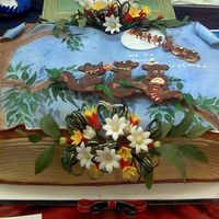 Keating_005.jpg Childrens Christmas story book Australian themed, rich fruit cake covered in rolled foundation with Australian wildflowers, gum leaves,...