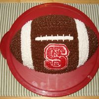 Nc State Wolfpack I made this football cake with the NC State University logo. It was a huge hit at the tailgate for the Meineke Car Care Bowl this past...