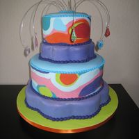 Summer Of 1969 Themed Cake This is my version of 1960's psychedelic art. I found a painting that inspired me for this. I also found some cool blown glass charms...