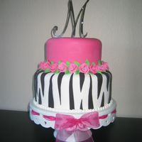 Meilissa's 40Th Birthday 9" and 6". Satin ice fondant with buttercream filling. I found a great place online for the topper....really cheap and fast....if...