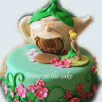 Tinkerbell This little girl wanted the cake from the Wilton year book . This was a fun cake to make and I think it turned out sweet.