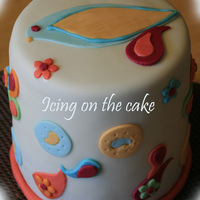 Paisley Baby Shower Cake This cake was a tall 6" cake for a baby shower. Based the cake on a swatch of fabric for the baby's room. Really cute colors.