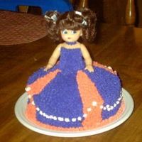 Doll Cake I didnt have the pan for a doll cake so I just used two round ones.It was one of the first cakes I ever made. I have never had classes,...