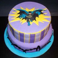 Batman Birthday Cake Batman cake covered in MMF. Fondant plaque on top, and MMF bats around the base tier.