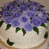 A Basket Of Purple Roses Purple fondant/gumpaste roses for my sister's birthday. Chocolate cake with cherry filling and whipped cream.
