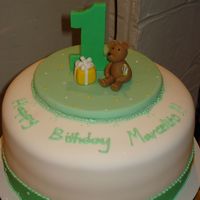 Bear's 1St Birthday! Cake order for my co-worker's nephew. It was his 1st birthday! The fondant didnt come out as smooth as I would have liked (a little...