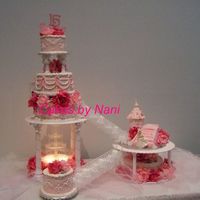 Marielle's Quinces I made this for my friends daughter, she wanted a cinderella theme so I made a castle for the second level....