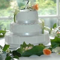 Autumn's Wedding Cake! This cake was for Autumn's (a co-worker) wedding. The tiers are vanilla and chocolate, filled and covered with buttercream, with...