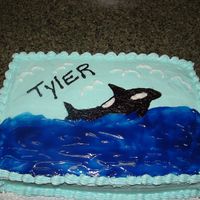 Whale Cake This was for a little boy who wanted a 'Whale' cake. It's all buttercream icing with piping gel for the water. I used the...