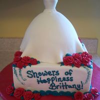 3D Wedding Dress Wonder mold on top of 10" square base. The colors of the wedding are red and turquoise. Parts of the wedding vows are written around...