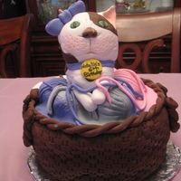 Cat Cake 10" round with cake half spheres under the fondant to make yarn balls. cat is cake and rice crispy treat. all fondant, all edible.