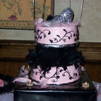 This Was For My Sister's "girly" Shower She wanted something femine, she picked this pink and black cake out of a bridal magazine. I added the slipper to it. I thought it turned...