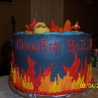 Crawfish Boil Cake I made this for our 2007 crawfish boil at work. It has 4 layers and fondant crawfish. The corn on the cob and baby potatoe are "ice...
