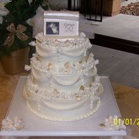 50Th Wedding Anniversary The roses and swags are fondant. The scroll is fondant, the pearls and leaves are fondant brushed with gold.