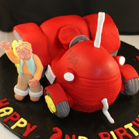 The Little Red Tractor This was made for a little boy who loves the little red tractor. Made from mud cake with red icing.