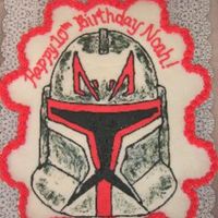 Clone Wars Cupcake Cake Chocolate cupcake cake (25 cupcakes) with clone wars storm trooper in red (did another one in blue as well). The storm trooper is a FBCT....