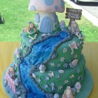 Fairy Cake 12" & 10" confetti cake covered in fondant. Fondant butterflies, bees, mushrooms, snails, ladybugs and flowers. Toadstool (...