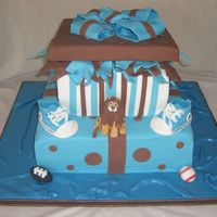 Leo's Baby Boy Shower Gift Cake Gift boxes with lion (baby's name will be Leo) and converse shoes (thanks to StellaStarChild for instructions and templates...they...