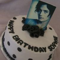 Twilight Jasper Cake 9" white cake covered in buttercream with edible image plaque and black fondant roses.