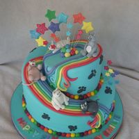 Rainbow Cat Cake This is for a 5 year old girl who wanted cats and rainbows. This cake was the outcome of that request. The cake is a "rainbow"...