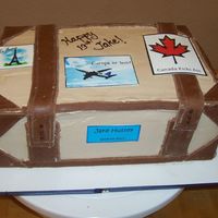 Suitcase Cake Genoise soaked in Kalhua sugar syrup, then layered and finished in mocha swiss meringue buttercream. The leather accents are Toba's...