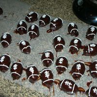 Football Cake Balls Yes, they're pretty sloppy, but I just threw these together for tonight's tailgaiting. Chocolate with peanutbutter...even though...