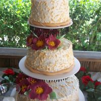 Floating Wedding Stand this is the secound wedding cake ive ever done, the first time ive ever attempted to make gunpaste flowers. let me know what you think.