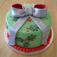 Christmas Bow With Holly Buttercream iced, fondant bow and holly. This is an old cake of mine and I didn't label the file correctly - I know I copied this idea...