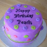 Dots And Ribbon Roses Buttercream iced, fondant accents