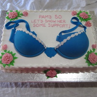 Offering A Little Support Fondant bra and buttercream carnations.