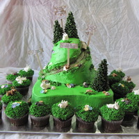 The Old Goat Is 50! Another version of my over the hill cake for a goat farmer. RI goats, fondant flowers; everthing else is buttercream.