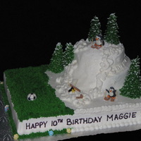Soccer And Skiing Birthday Cake The birthday girl loves to play soccer and ski. So I combined them both in this fun cake! Royal icing penguins, fondant soccer ball and...