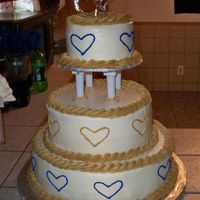 Wedding Cake I was really disappointed in this cake because it looks more like a child's birthday cake then a wedding cake. This is what the young...