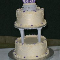 Anniversary Cake I made this cake for a couple's anniversary. I was not excited about using candles for the topper, but it is what the couple wanted....