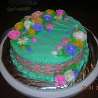 Spring Cake This is a cake I made in my Wilton Classes. When I made this cake the air conditioner wasn't working in my house. So the icing kept...