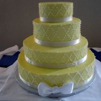 Yellow And White Diamonds All buttercream with satin ribbon. 16, 12, 9 and 6. Bride brought me a photo of something similar.