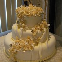 50Th Anniversary Cake This is the cake I made for my parents for thier 50th Anniversary this past weekend. I had just finished teaching myself how to make the...