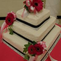 Wedding Cake For Eleah And Kyle This is by far the heaviest cake that I've made! Top layer is lemon, middle layer is chocolate and bottom layer is carrot cake. All...